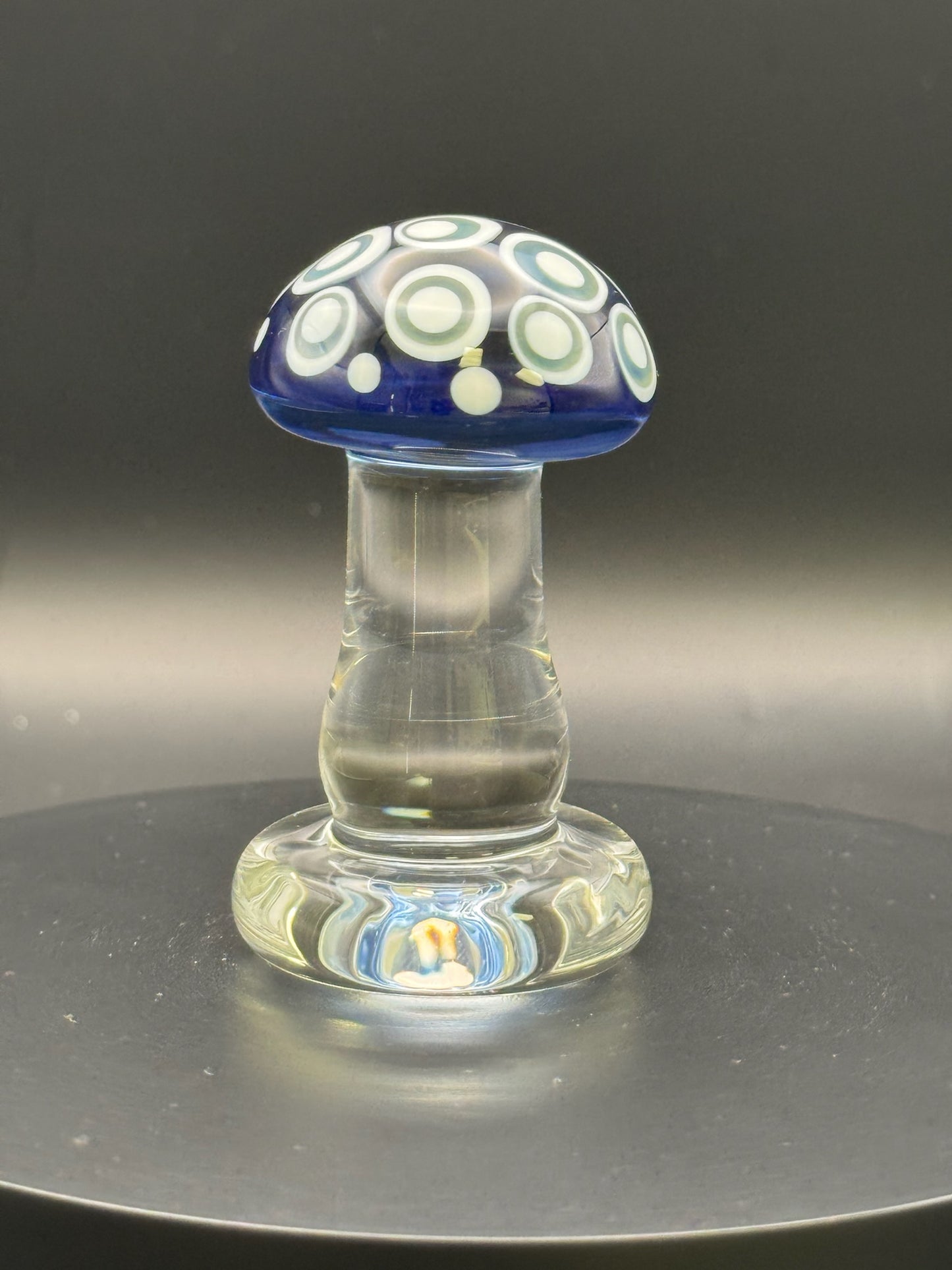 chg007 - $45 - sculpture - 2.8" clear mushroom sculpture w/ transparent blue cap and white/grey dot stacks.