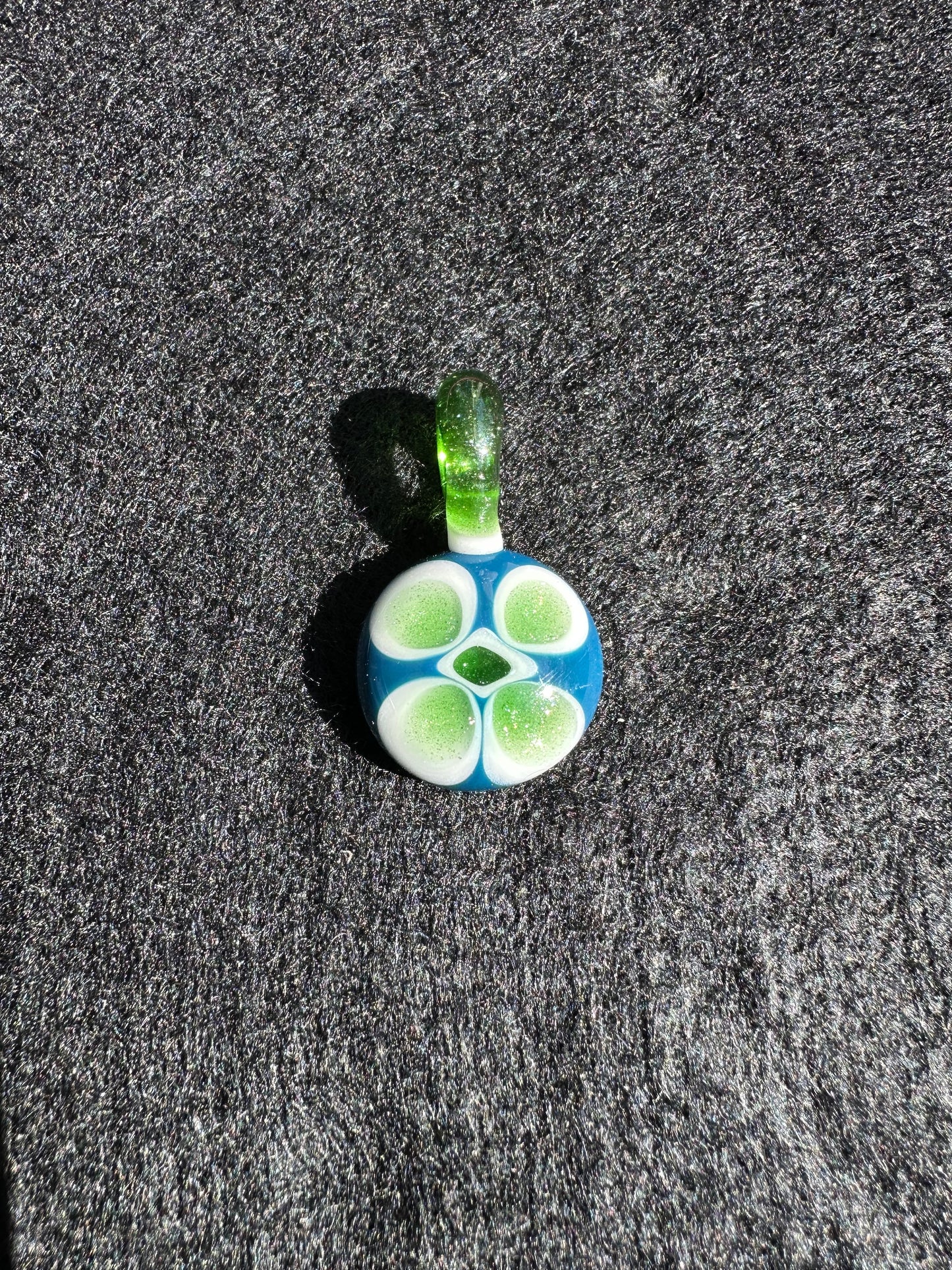 Pyrexian Energy Core #001 – Green Stardust Pendant by Jaime Torres