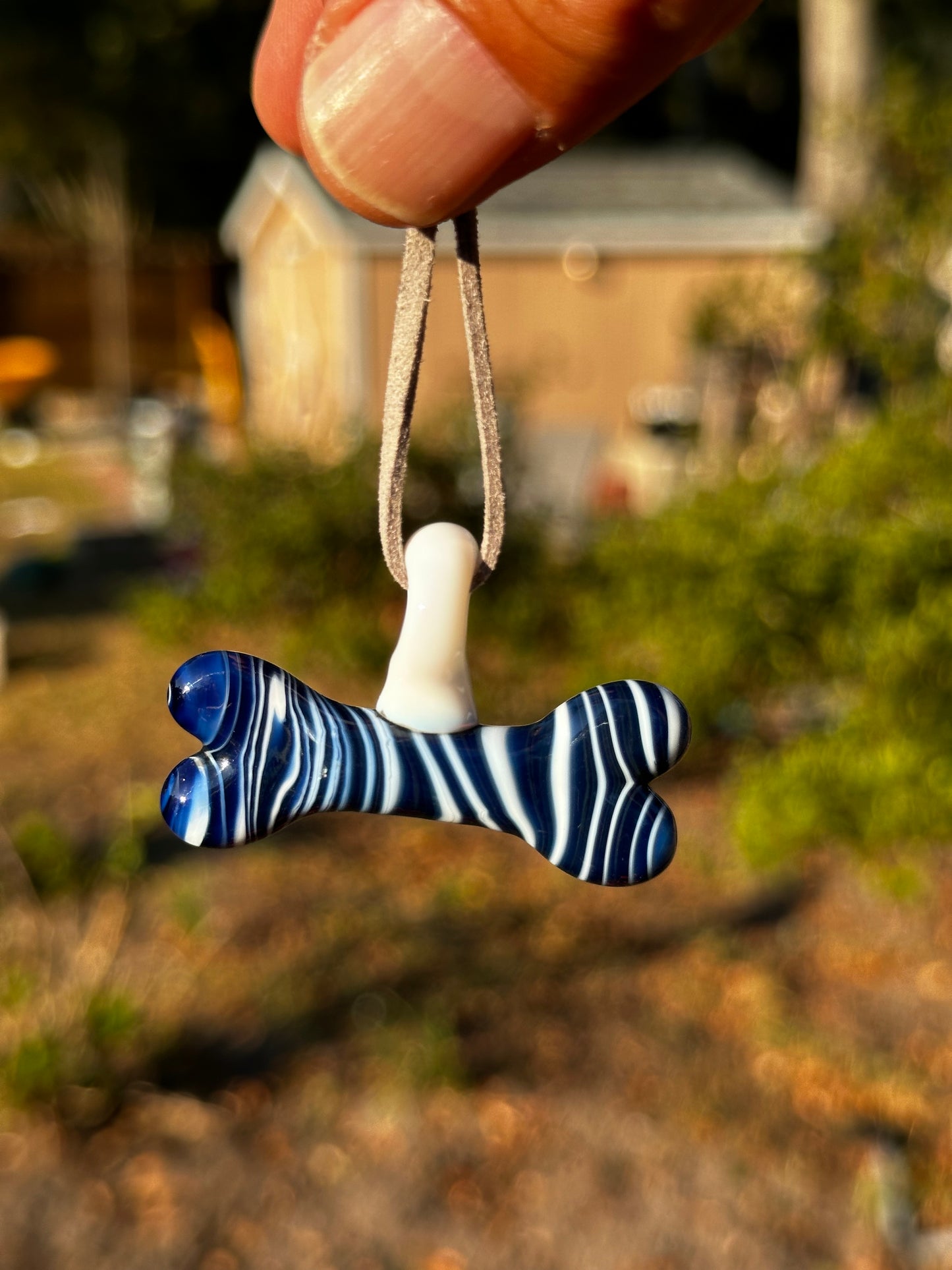 Blue and White Zebra Dog Bone Pendant